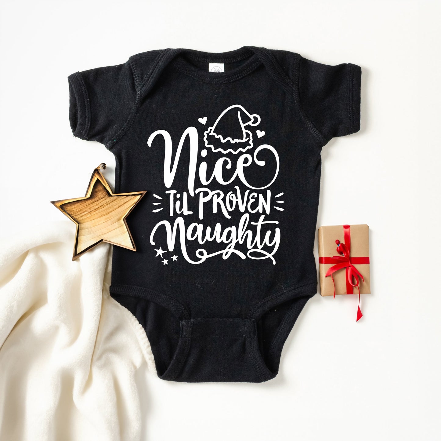 Nice Til Proven Naughty | Baby Graphic Short Sleeve Bodysuit