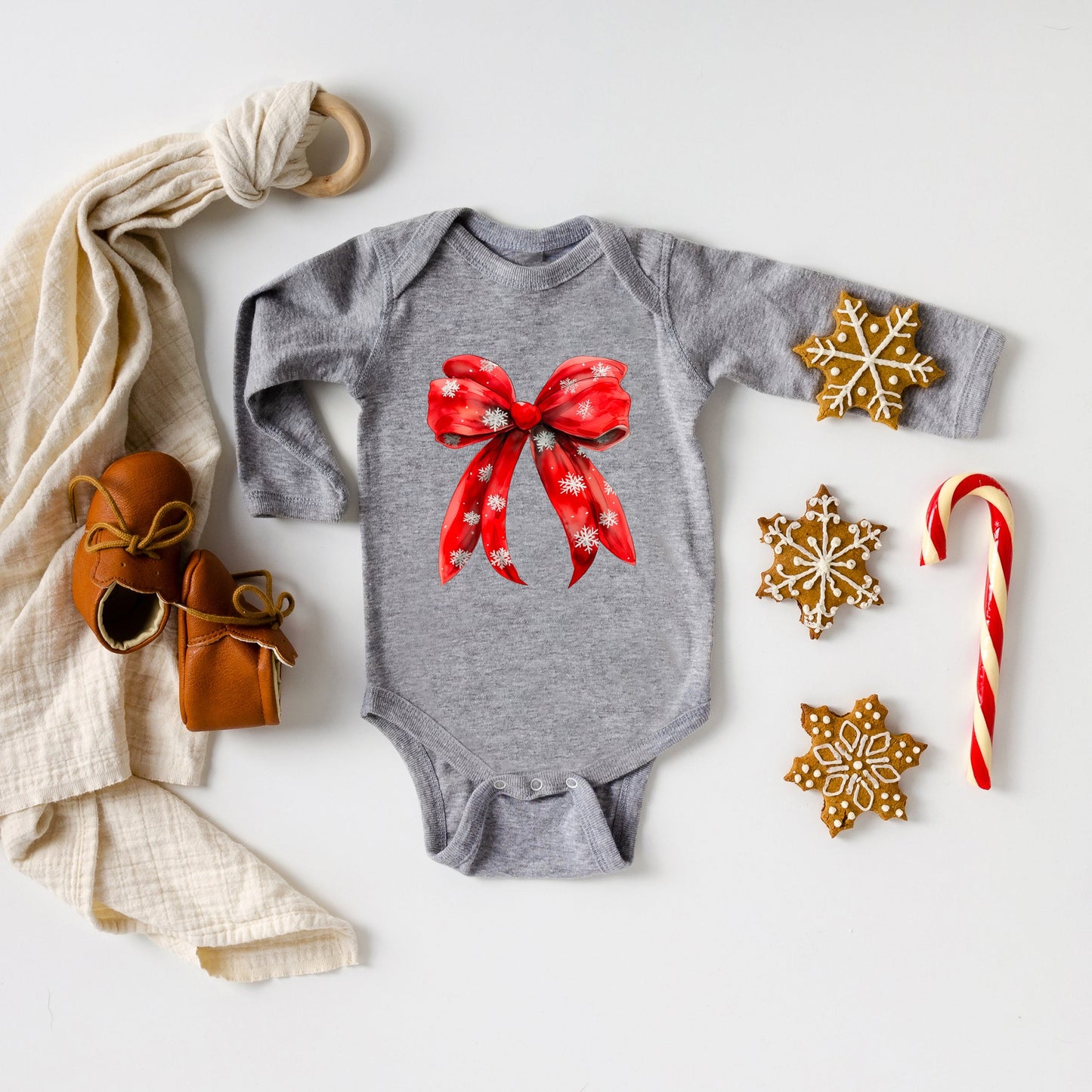 Coquette Christmas Snowflake Bow | Baby Graphic Long Sleeve Bodysuit
