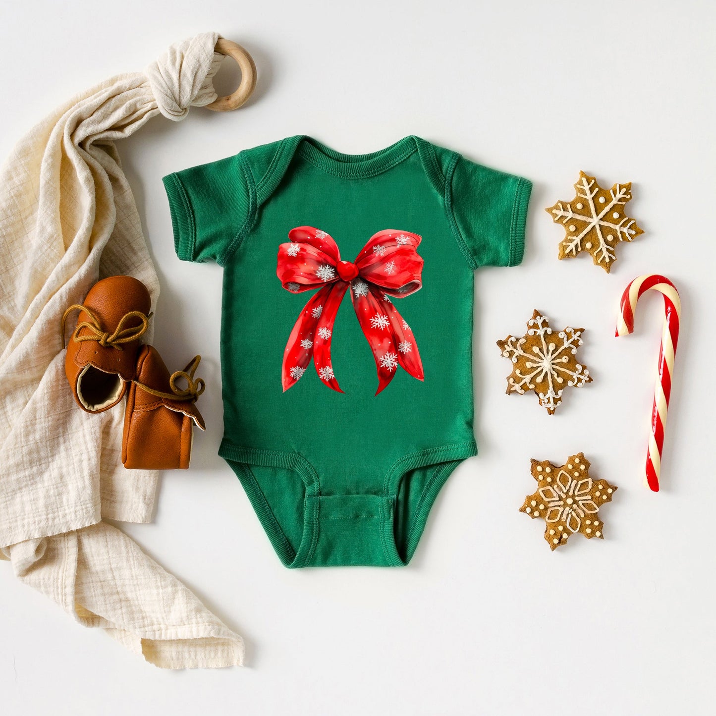 Coquette Christmas Snowflake Bow | Baby Graphic Short Sleeve Bodysuit