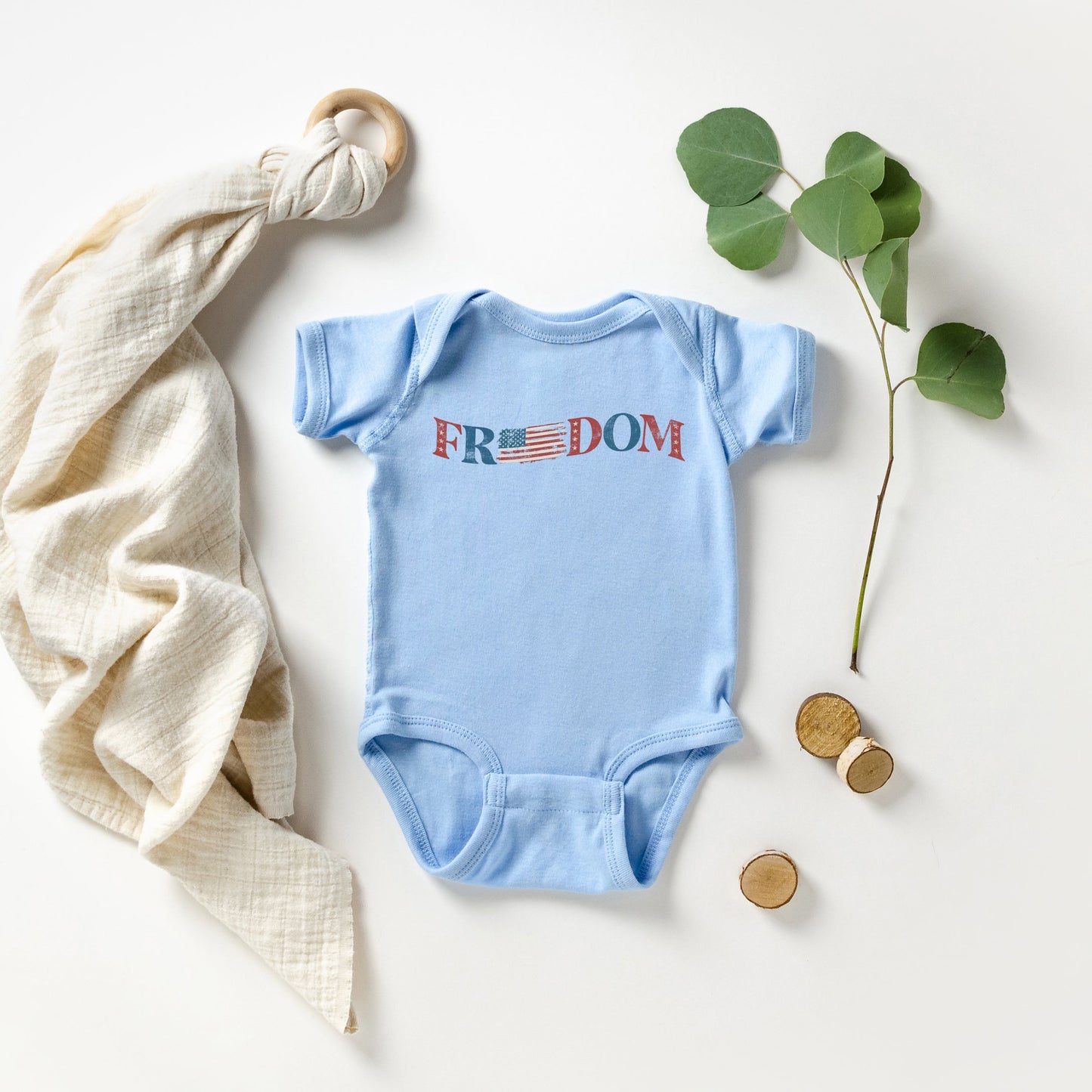 Distressed Freedom American Flag | Baby Graphic Short Sleeve Bodysuit