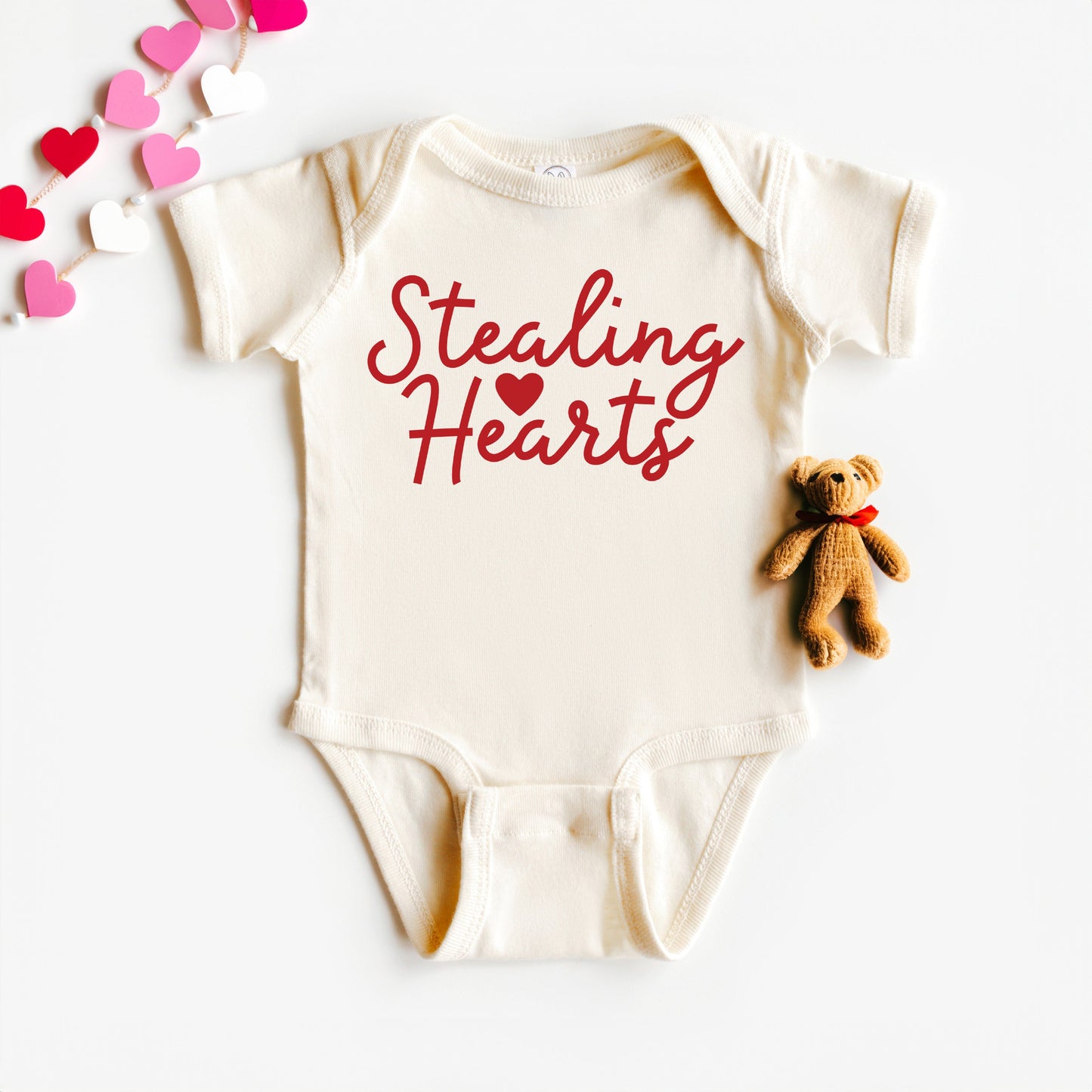 Stealing Hearts Cursive | Baby Graphic Short Sleeve Bodysuit