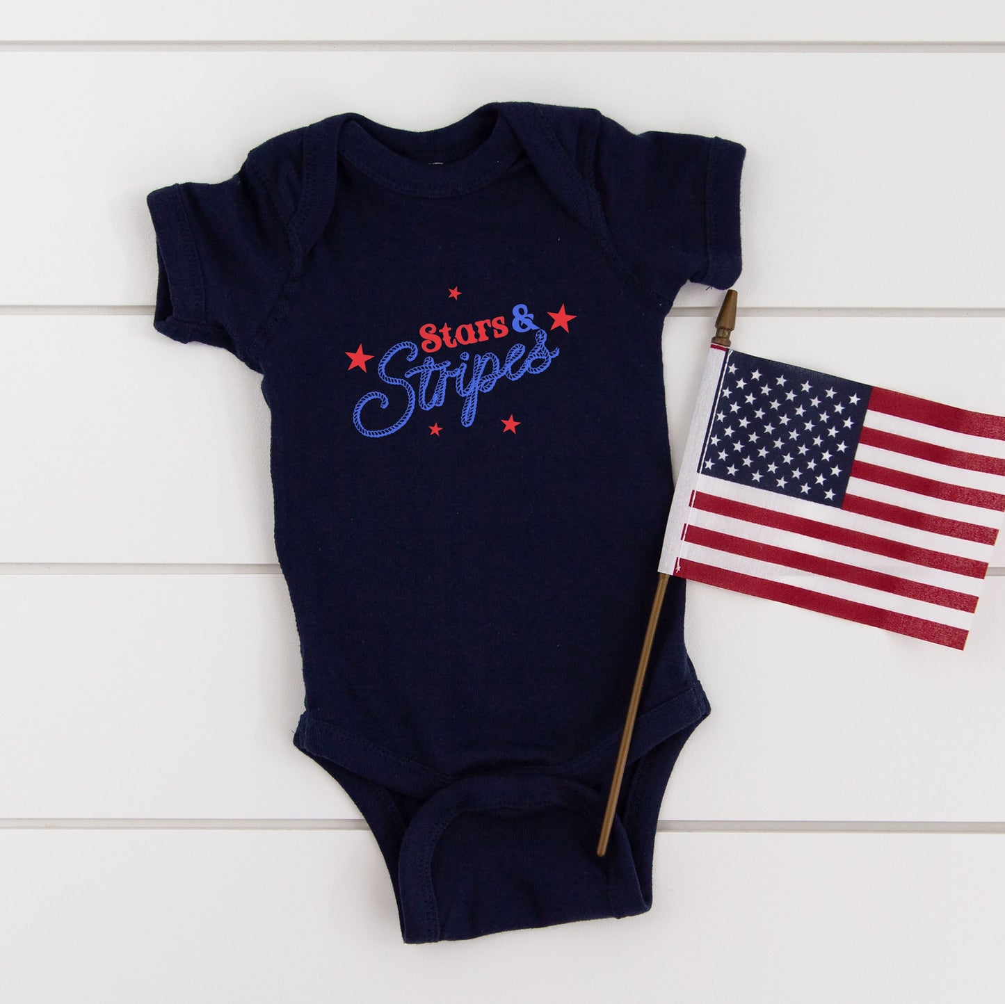 Western Stars And Stripes | Baby Graphic Short Sleeve Bodysuit