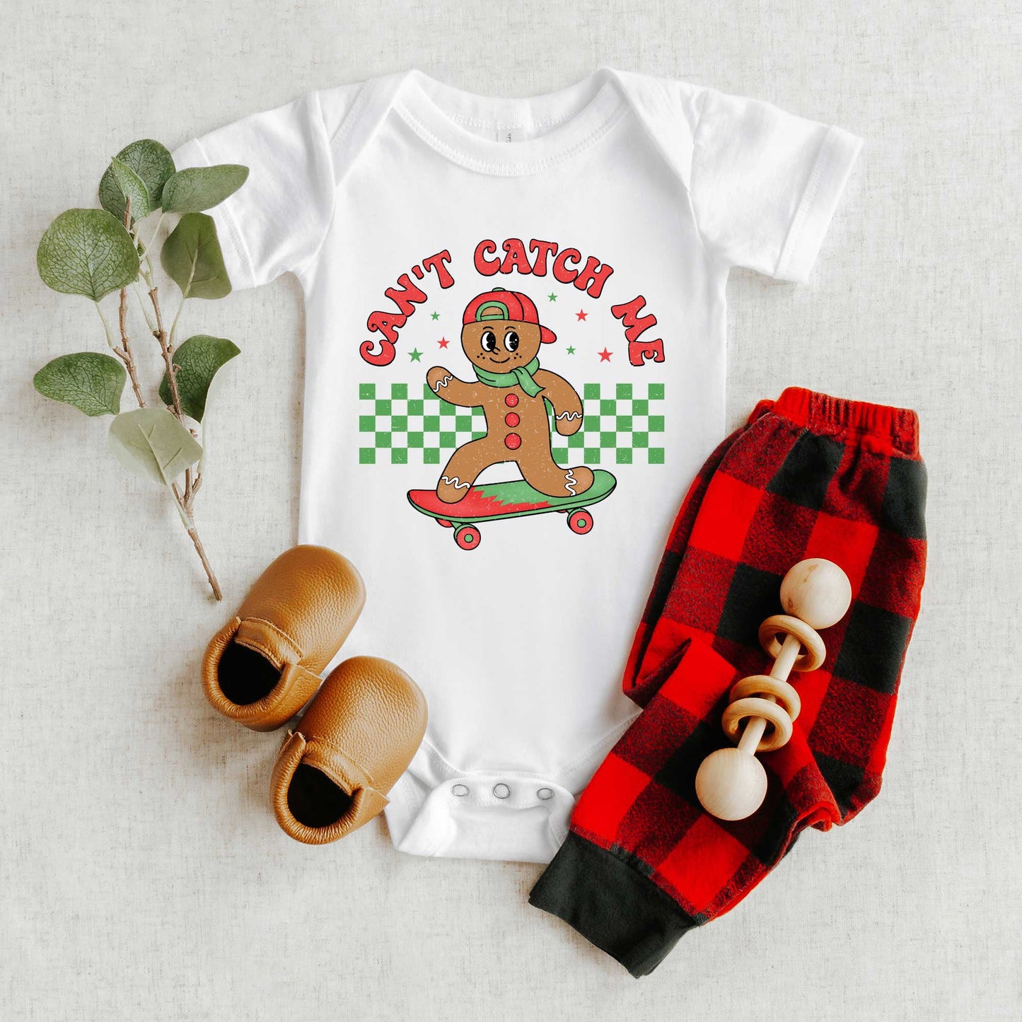 Gingerbread Man Skateboard | Baby Graphic Short Sleeve Bodysuit