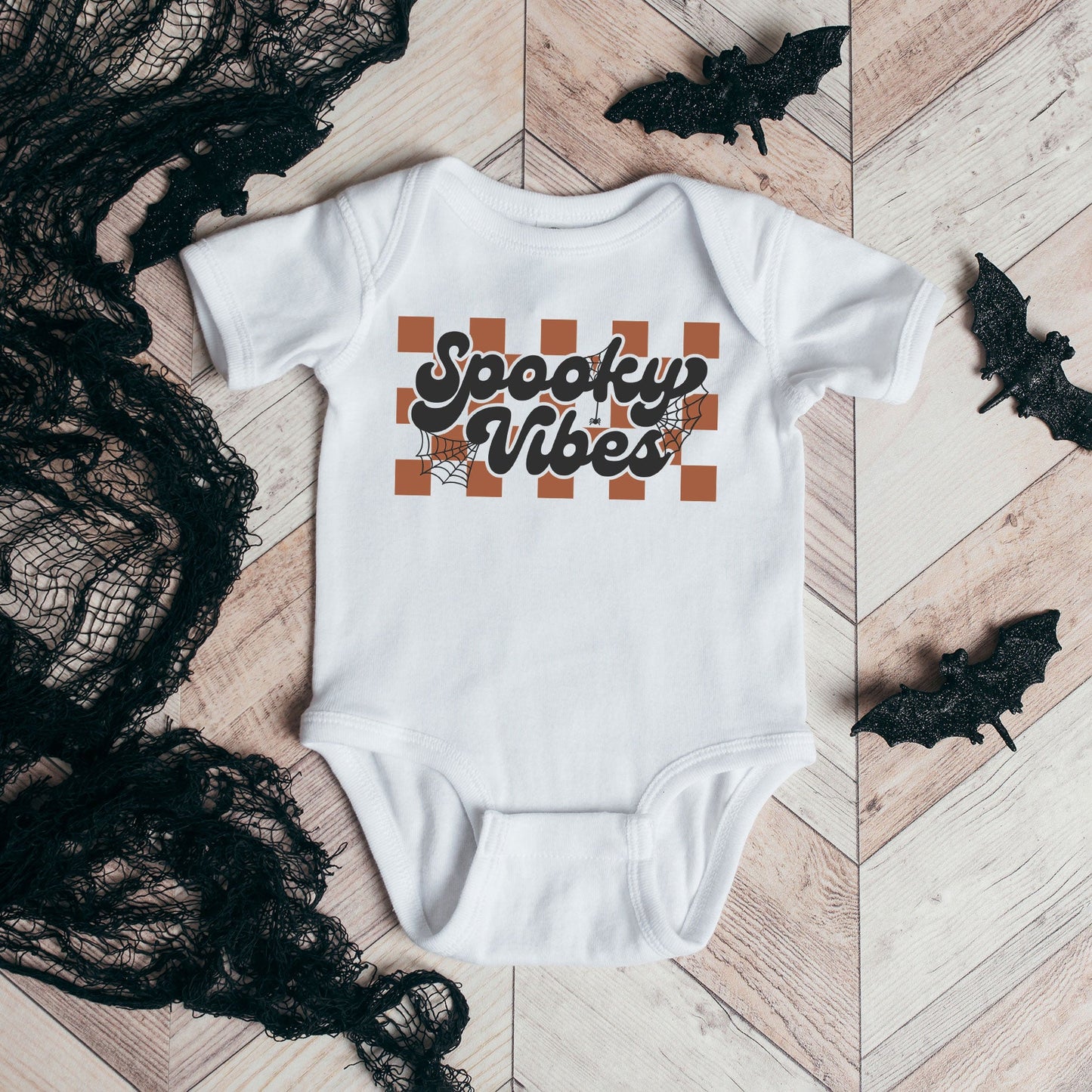Checkered Spooky Vibes | Baby Graphic Short Sleeve Bodysuitesie