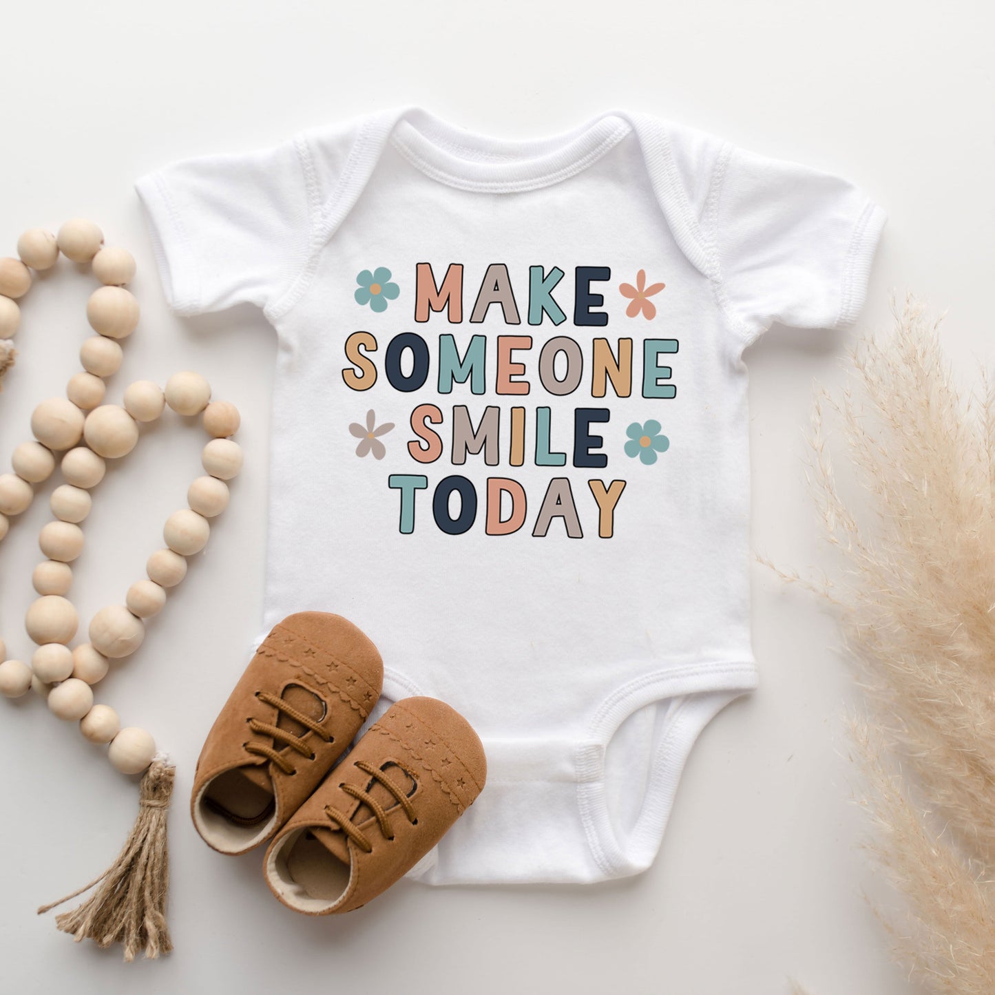 Make Someone Smile Today | Baby Graphic Short Sleeve Bodysuit