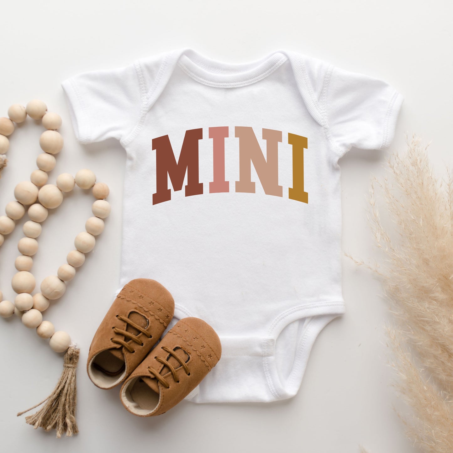 Mini Colored Arch | Baby Graphic Short Sleeve Bodysuit