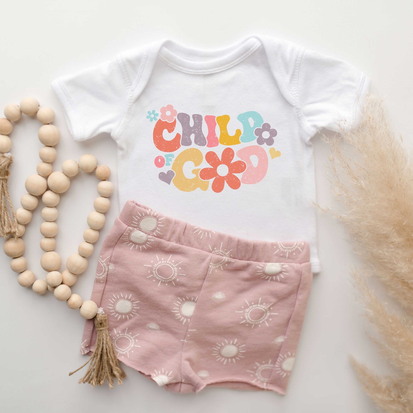 Child Of God Flowers | Baby Graphic Short Sleeve Bodysuit