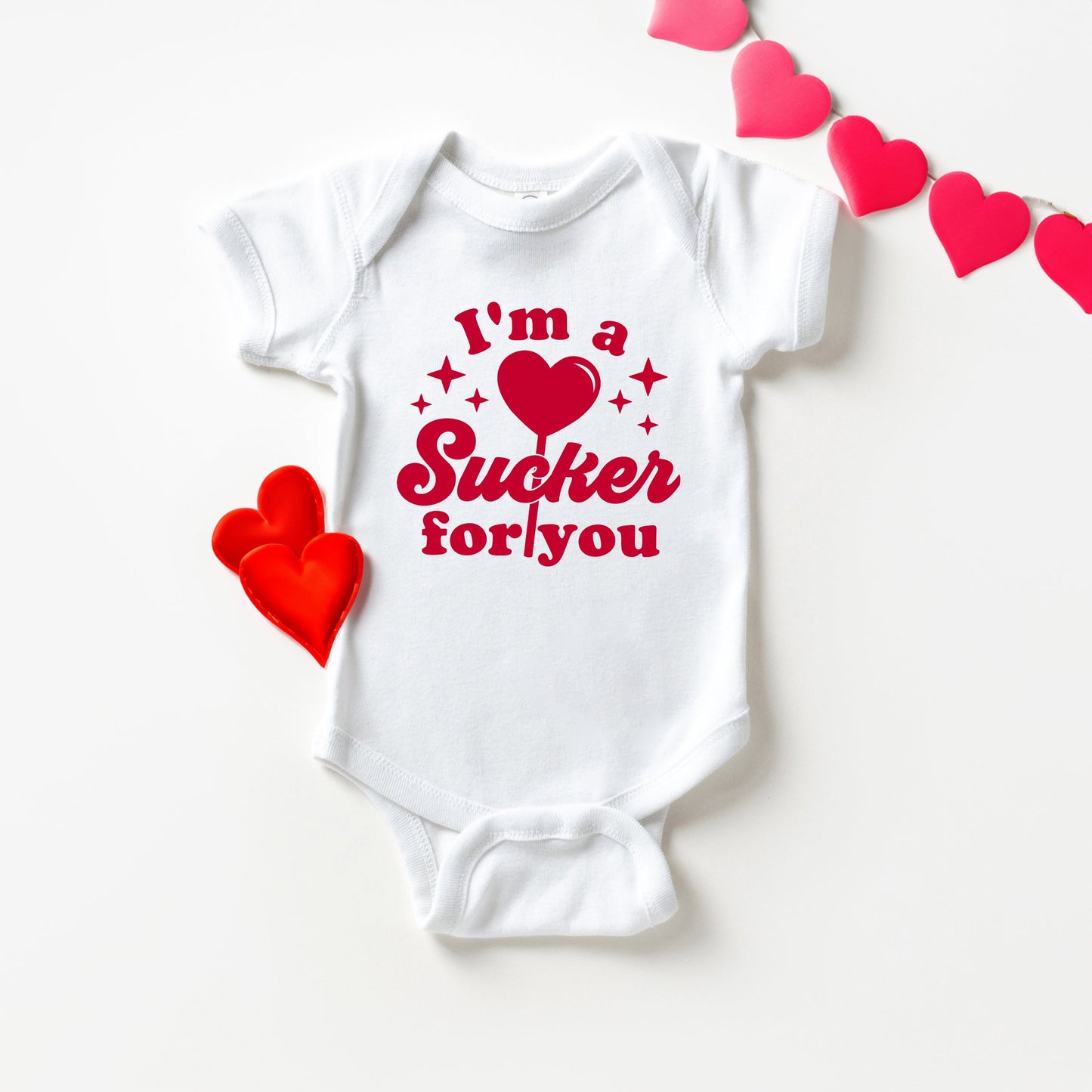 Sucker For You | Baby Graphic Short Sleeve Bodysuit